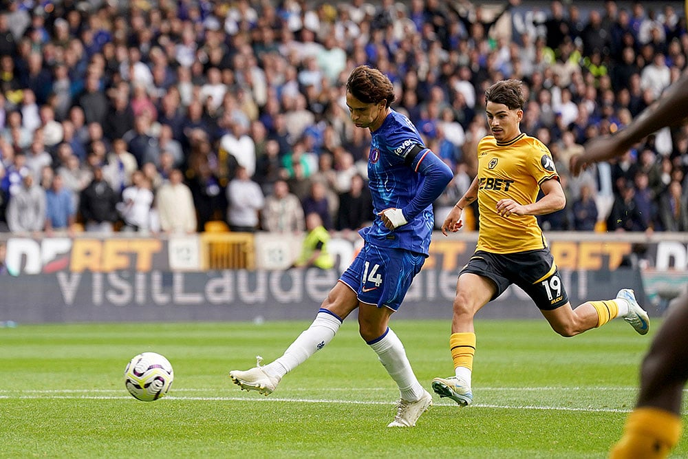 | Photo: Joe Giddens/PA via AP : Premier League 2024-25: Chelsea's Joao Felix scores his sides sixth goal against Wolves